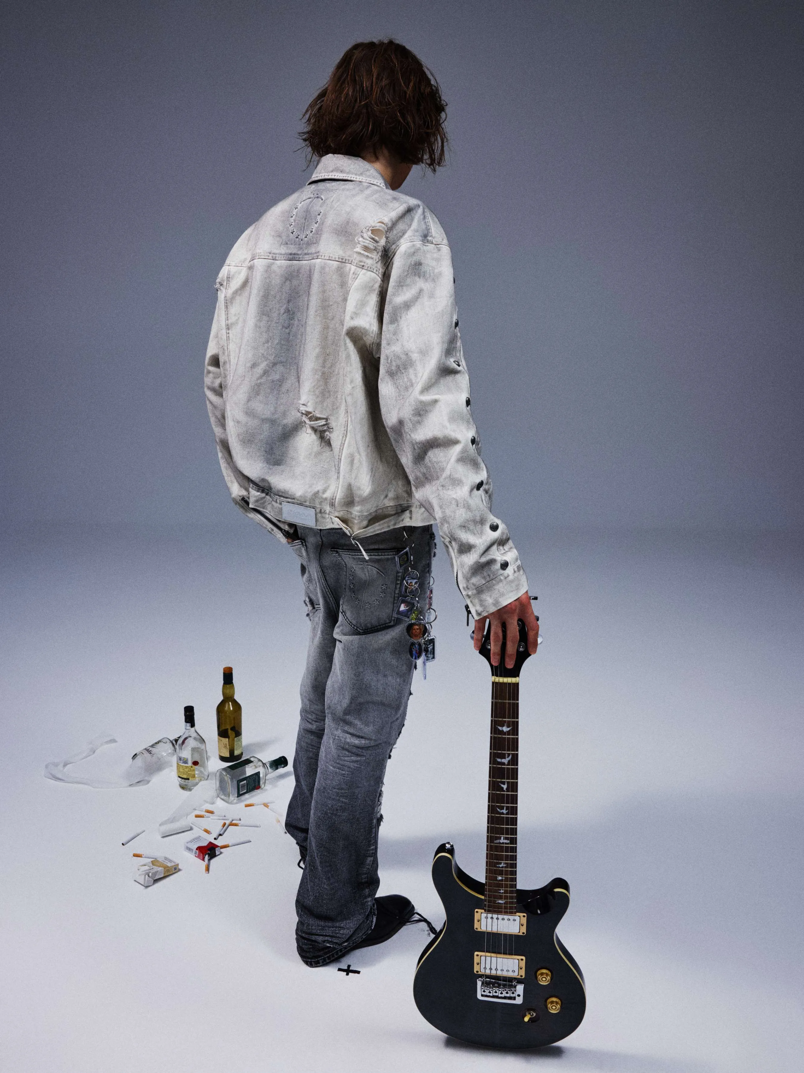 Vintage work jacket with a white lime plaster wash